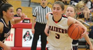 Brooke Guiffre (3) fights off a double team and drives the ball to the basket for two of her game-high 22 points during Wellesley’s 18-point victory over Revere on Wednesday night.