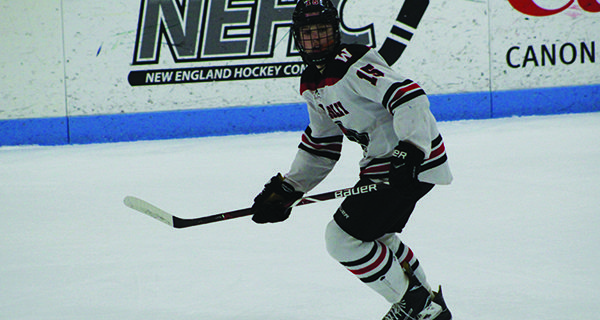 Pictured last year against Needham, senior forward Henry Gould (15) will look to build off of a strong junior season.