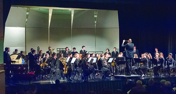 The Medfield High School Concert Band led by their new director, Mr. Jason Bielik.  Photographs by Audrey Anderson