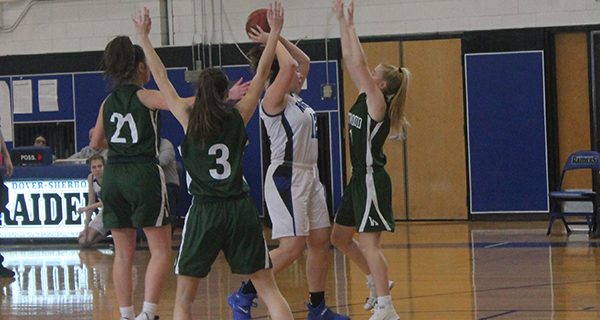 Westwood’s stifling defense stalls another possession in the Wolverines’ 57-24 victory over Dover-Sherborn. Photos by James Kinneen