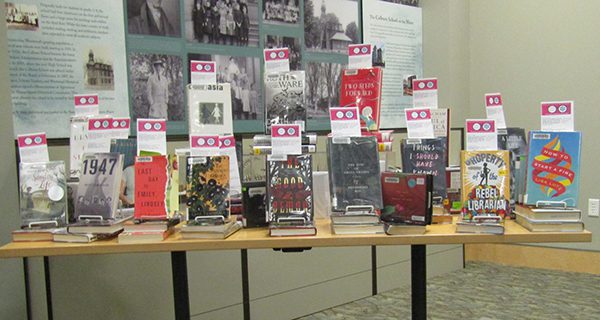 The display of books set up for attendees of the presentation to borrow their next read from after the book talks.