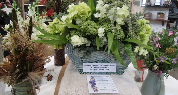 The winning arrangement from Friday's opening night created by Janice Cederquist (flowers) and Helayne Ramirez (pottery).
