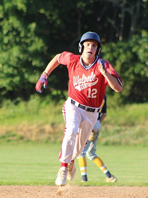 Chris McLean (pictured) gets on his horse and heads to third before coming around as the go-ahead and would be game-winning run in the bottom of the fifth. Photos by Mike Flanagan