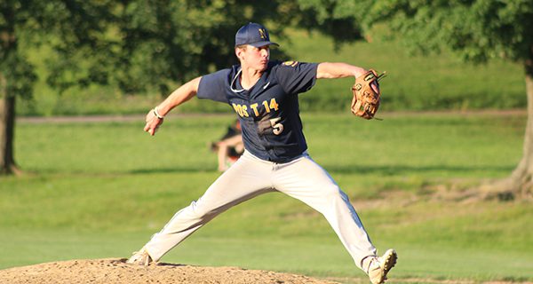 Kevin MacKenzie fires home a pitch during Needham’s Legion’s contest at Walpole on Monday night. Photos by Mike Flanagan