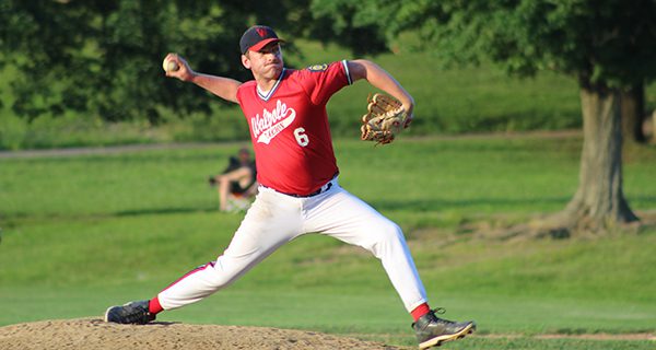Matt Donato (pictured) fires home a pitch while closing out Walpole Legion’s 5-4 comeback victory against Needham on Monday.  Photos by Mike Flanagan