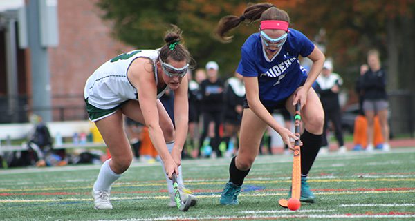 Dover-Sherborn’s Merritt Sullivan (right) and Westwood’s Kendall Blomquist (left) battle for a loose ball.