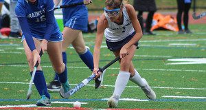 Sophomore Jessica Tosone (3) shields the ball from a defender and drives towards the cage during her two-goal performance on Thursday against Braintree.